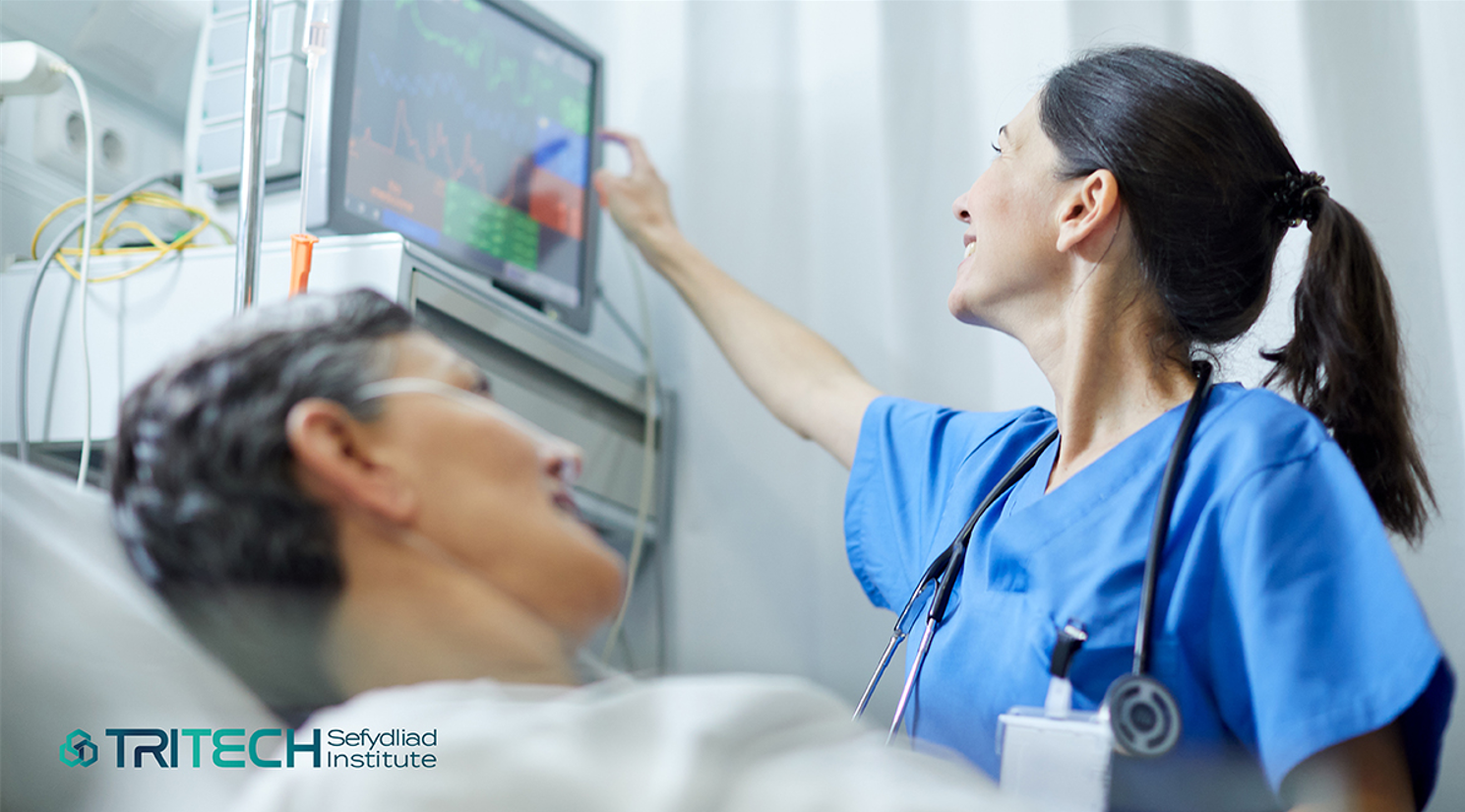 A person in hospital being cared for by a nurse