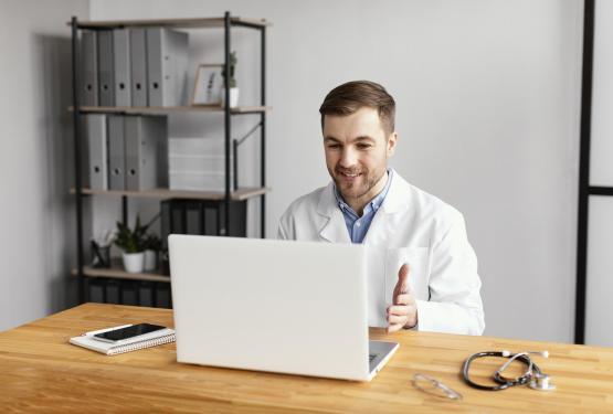 Doctor on video call on laptop